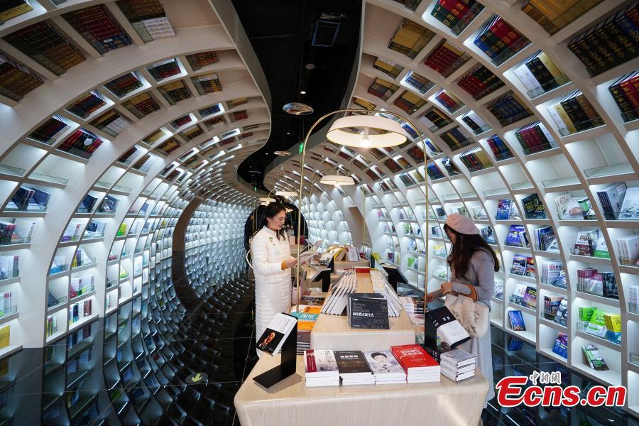 Neatly-arranged books are set on shelves at a new outlet of the Zhongshuge bookstore in Guiyang City, Southwest China’s Guizhou Province, Oct. 29, 2018. The design of the store took inspiration from the karst landforms of the province and features other signature tourism and cultural icons, making it a fresh attraction for local readers and other visitors. (Photo: China News Service/He Junyi)