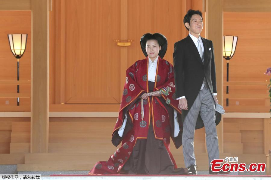 Photo taken on Oct. 29, 2018 shows Japan\'s Princess Ayako married a commoner at Meiji Shrine in Tokyo, Japan. The wedding ceremony included an exchange of rings and a sharing of a cup of sake, according to Japanese media. Ayako, 28, is the daughter of the emperor\'s cousin, and Moriya, 32, works for major shipping company Nippon Yusen. (Photo/Agencies)