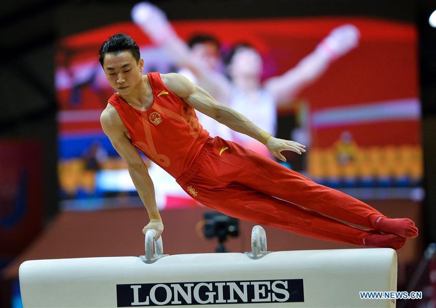 Zou Jingyuan of China competes on the pommel horse during the Men\'s Team Final at the 2018 FIG Artistic Gymnastics Championships in Doha, capital of Qatar, Oct. 29, 2018. Team China won the gold medal. (Xinhua/Nikku)