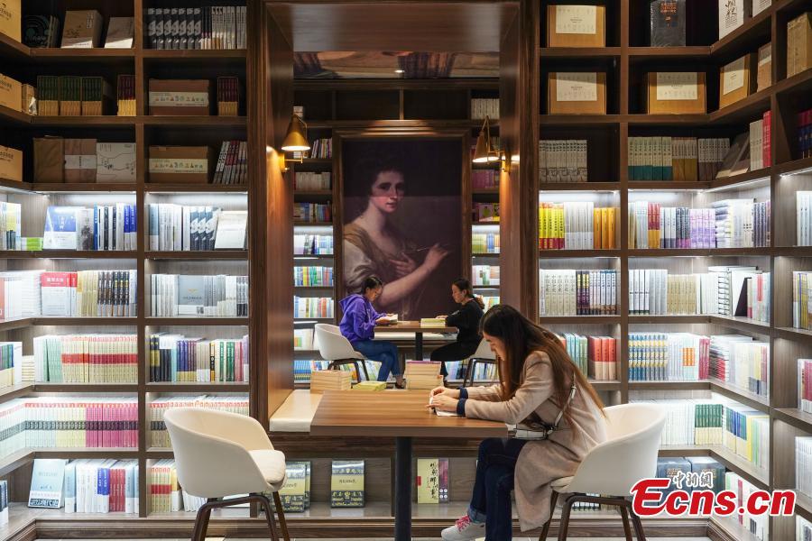 Neatly-arranged books are set on shelves at a new outlet of the Zhongshuge bookstore in Guiyang City, Southwest China’s Guizhou Province, Oct. 29, 2018. The design of the store took inspiration from the karst landforms of the province and features other signature tourism and cultural icons, making it a fresh attraction for local readers and other visitors. (Photo: China News Service/He Junyi)