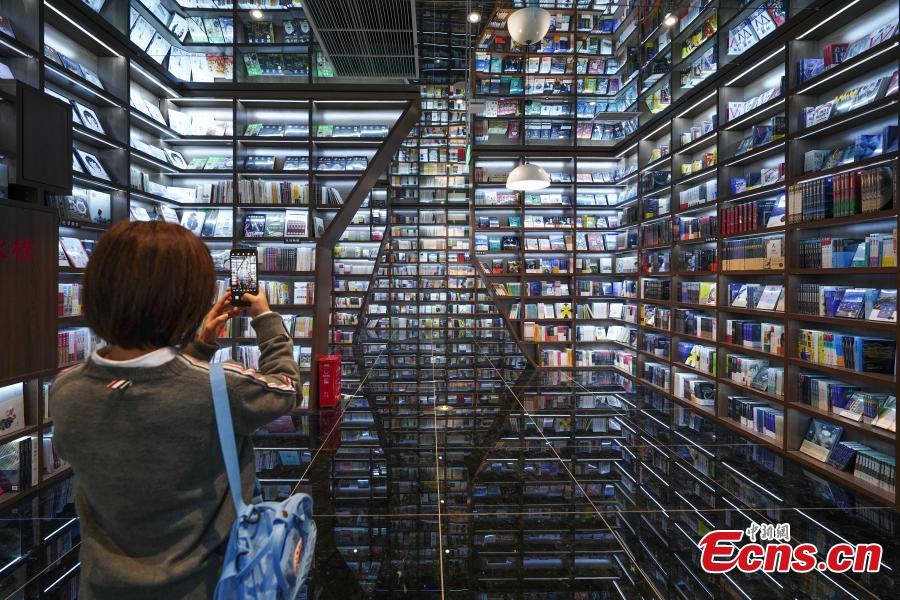 Neatly-arranged books are set on shelves at a new outlet of the Zhongshuge bookstore in Guiyang City, Southwest China’s Guizhou Province, Oct. 29, 2018. The design of the store took inspiration from the karst landforms of the province and features other signature tourism and cultural icons, making it a fresh attraction for local readers and other visitors. (Photo: China News Service/He Junyi)