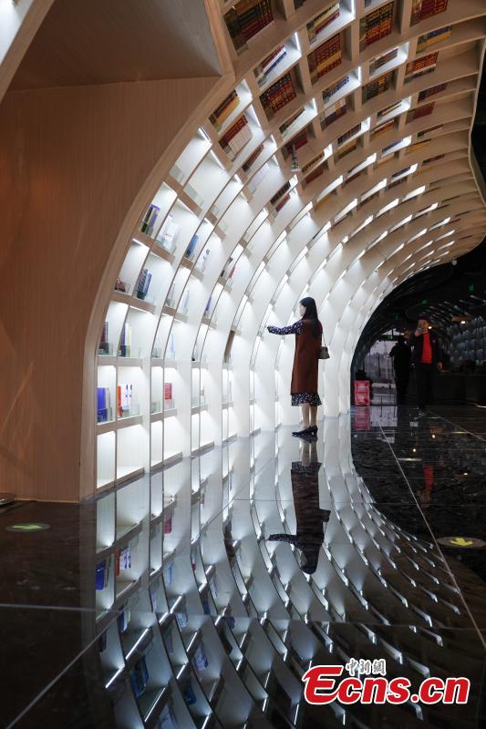 Neatly-arranged books are set on shelves at a new outlet of the Zhongshuge bookstore in Guiyang City, Southwest China’s Guizhou Province, Oct. 29, 2018. The design of the store took inspiration from the karst landforms of the province and features other signature tourism and cultural icons, making it a fresh attraction for local readers and other visitors. (Photo: China News Service/He Junyi)