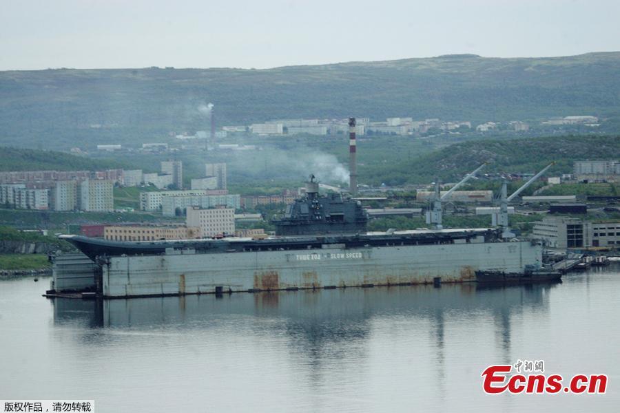 Russia\'s aircraft carrier, the Admiral Kuznetsov, was damaged in Murmansk when the dry dock PD-5 where it was undergoing a refit sank on Oct. 30, 2018, sending a giant crane crashing on to the ship. PD-5 is known as one of the world\'s largest floating dry docks. (Photo/Agencies)