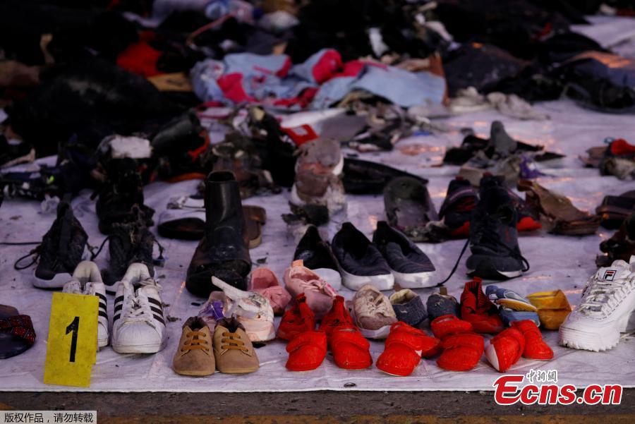 Recovered shoes believed to be from the crashed Lion Air flight JT610 are laid out at Tanjung Priok port in Jakarta, Indonesia, November 1, 2018. (Photo/Agencies)
