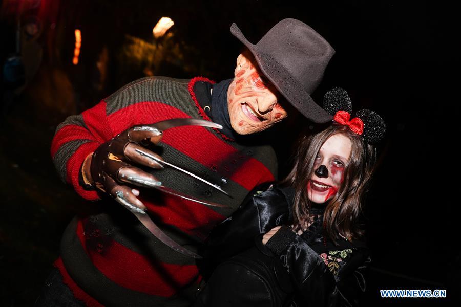 People take part in a Halloween parade in Brussels, Belgium, Oct. 31, 2018. (Xinhua/Zheng Huansong)