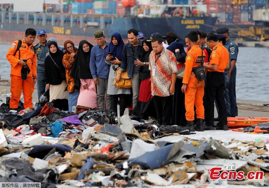 Families of passengers of  Lion Air flight JT610 stand as they look at the belongings of the passengers at Tanjung Priok port in Jakarta, Indonesia, October 31, 2018. (Photo/Agencies)