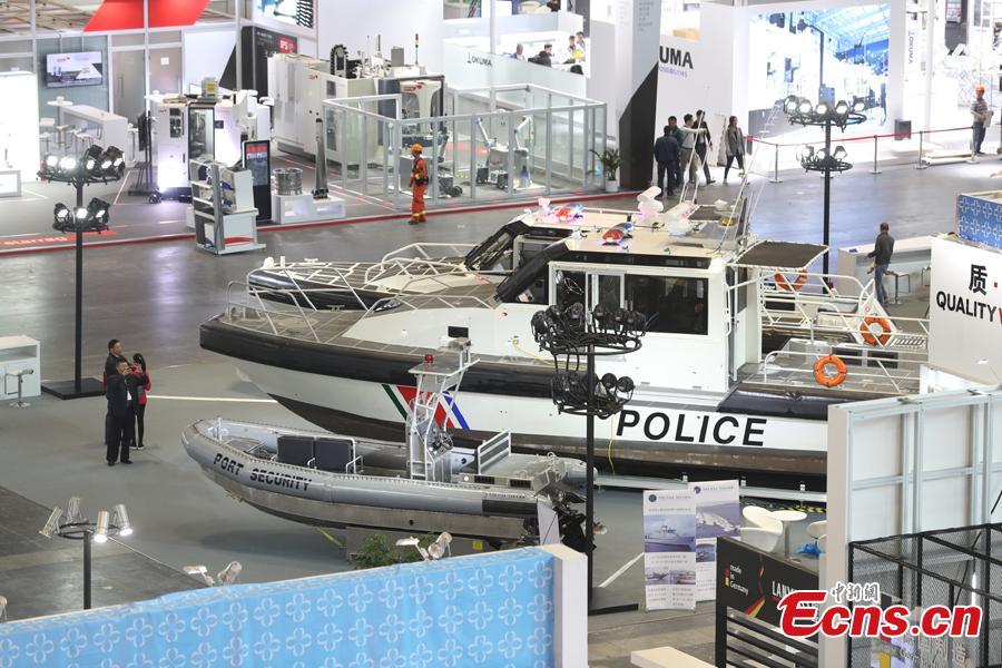 This photo taken on Nov. 2, 2018 shows intelligent and high-end equipment are in place at the exhibition hall of the first China International Import Expo (CIIE). Covering a total exhibition area of 60,000 square meters, it will showcase large and heavy products in the technology-intensive fields of aerospace, robotics and automation. More than 400 enterprises from 40 countries and regions all over the world will participate in this expo. (Photo: China News Service/Zhang Hengwei)