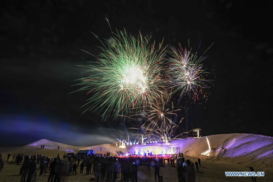 A fireworks show is staged for tourists in Qiemo County, northwest China\'s Xinjiang Uygur Autonomous Region, Oct. 20, 2018. Xinjiang received more than 130 million tourists in the first nine months of 2018, up 38.15 percent year on year. (Xinhua/Zhao Ge)