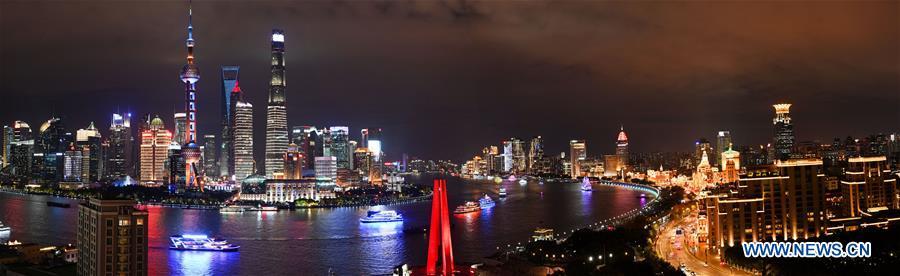 Stitched photo taken on Nov. 2, 2018 shows the night view in Shanghai, east China. The first China International Import Expo (CIIE) will be held on Nov. 5-10 in Shanghai. (Xinhua/Chen Yehua)
