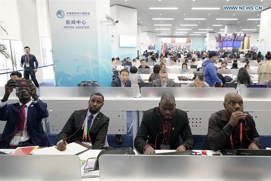 Journalists work at the media center of the first China International Import Expo (CIIE) in Shanghai, east China, Nov. 5, 2018. The first CIIE opened here on Monday and has drawn much attention from domestic and international media. (Xinhua/Shen Bohan)