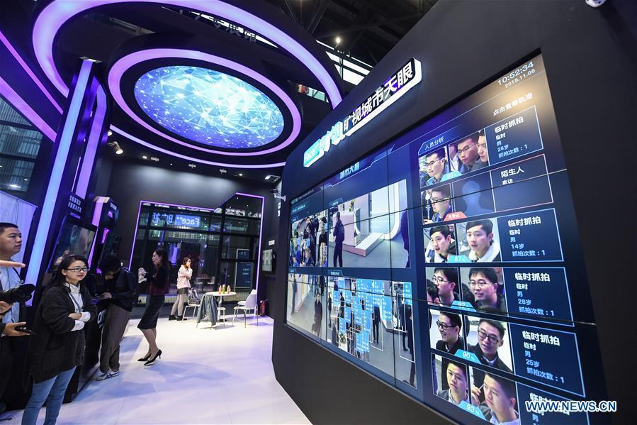 A facial recognition system is displayed at the Light of Internet Expo of the fifth World Internet Conference in Wuzhen Township of Tongxiang, east China\'s Zhejiang Province, Nov. 6, 2018. Opening here on Tuesday, the exposition focuses on the world\'s most recent internet development trends and cutting-edge technologies, showing the latest internet technologies, achievements, products and applications of more than 430 enterprises and institutions from home and abroad. (Xinhua/Xu Yu)