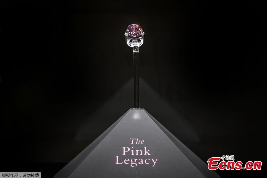 The Pink Legacy, a 18.96 carat fancy vivid pink diamond once owned by Oppenheimer family is displayed on November 8, 2018 during a press preview ahead of sales by Christie\'s auction house in Geneva. - The auction will take place in Geneva on November 13, 2018.  (Photo/Agencies)