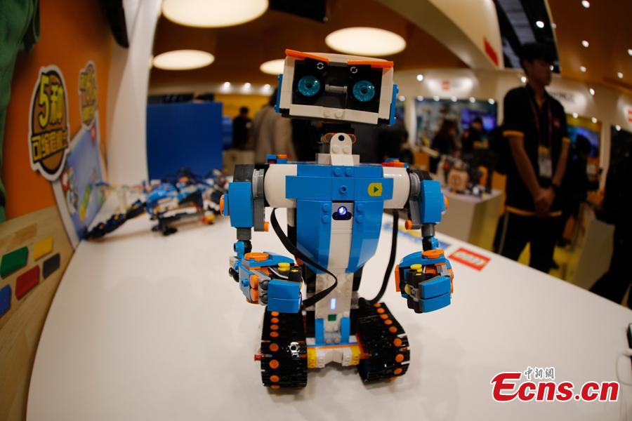 An intelligent toy robot developed by LEGO Group is displayed at the first China International Import Expo in Shanghai, Nov. 8, 2018. (Photo: China News Service/ Du Yang)