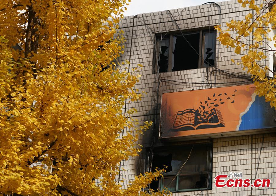A fire at a low-cost dormitory-style housing facility in central Seoul, South Korea, is put out  Nov. 9, 2018. The fire killed at least seven people and injured 11. Authorities are investigating possible safety lapses in the building.(Photo: China News Service/Zeng Nai)