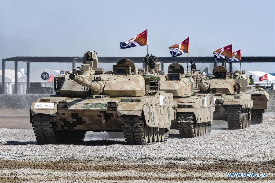 Armored vehicles attend a dynamic display of ground military equipments at the 12th China International Aviation and Aerospace Exhibition (Airshow China) in Zhuhai, south China\'s Guangdong Province, on Nov. 7, 2018. (Xinhua/Yang Guang)