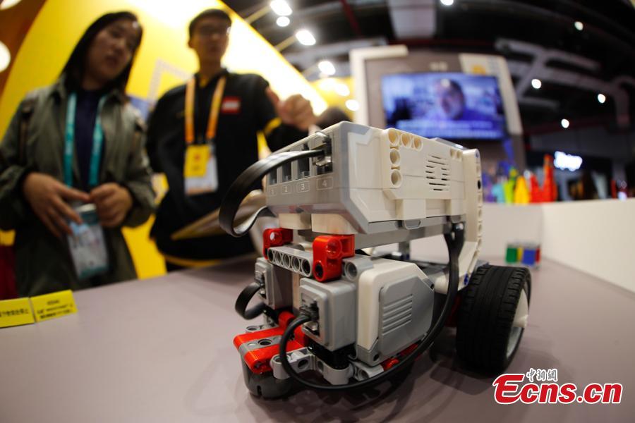 A smart toy developed by LEGO Group is displayed at the first China International Import Expo in Shanghai, Nov. 8, 2018. (Photo: China News Service/ Du Yang)