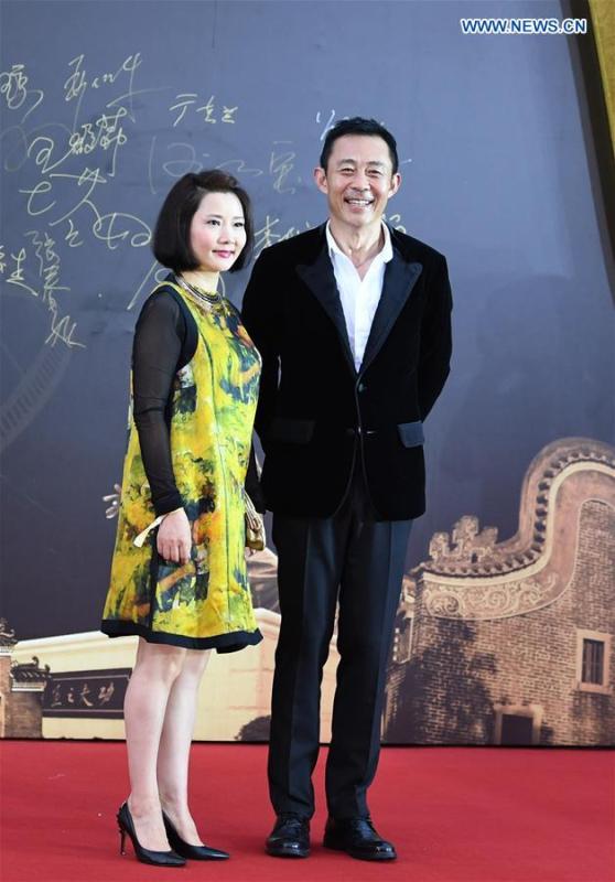 Actor Hou Yong (R) attends the red carpet ceremony of the 27th China Golden Rooster & Hundred Flowers Film Festival in Foshan, south China\'s Guangdong Province, Nov. 10, 2018. The red carpet ceremony of the 27th China Golden Rooster & Hundred Flowers Film Festival was held here on Saturday. (Xinhua/Deng Hua)