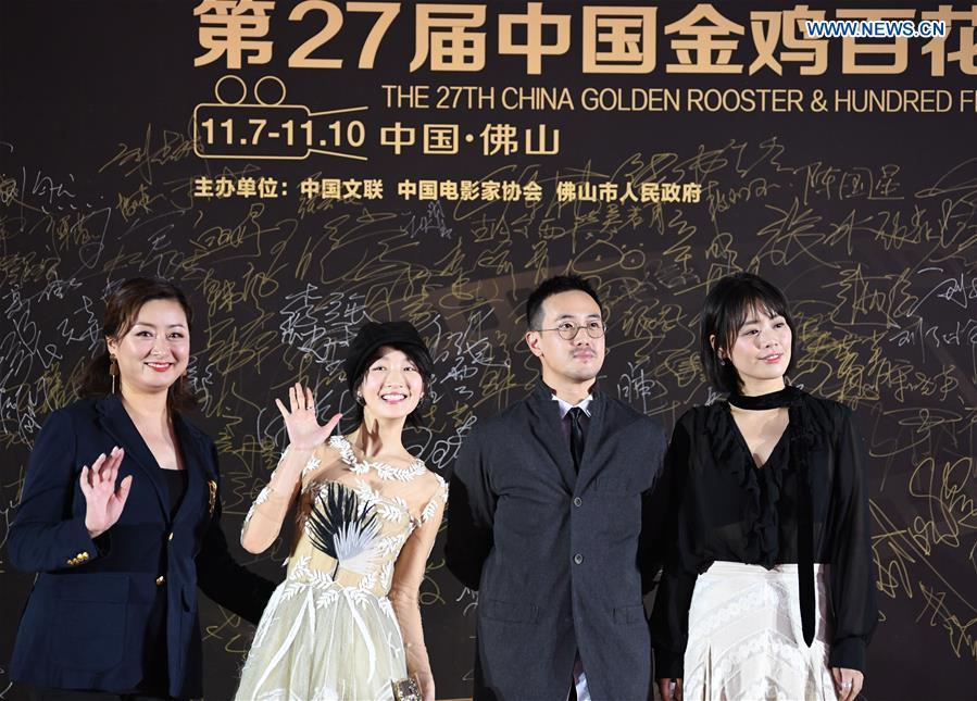 Actresses Zhou Dongyu (2nd L) and Ma Sichun (1st R) attend the red carpet ceremony of the 27th China Golden Rooster & Hundred Flowers Film Festival in Foshan, south China\'s Guangdong Province, Nov. 10, 2018. The red carpet ceremony of the 27th China Golden Rooster & Hundred Flowers Film Festival was held here on Saturday. (Xinhua/Deng Hua)