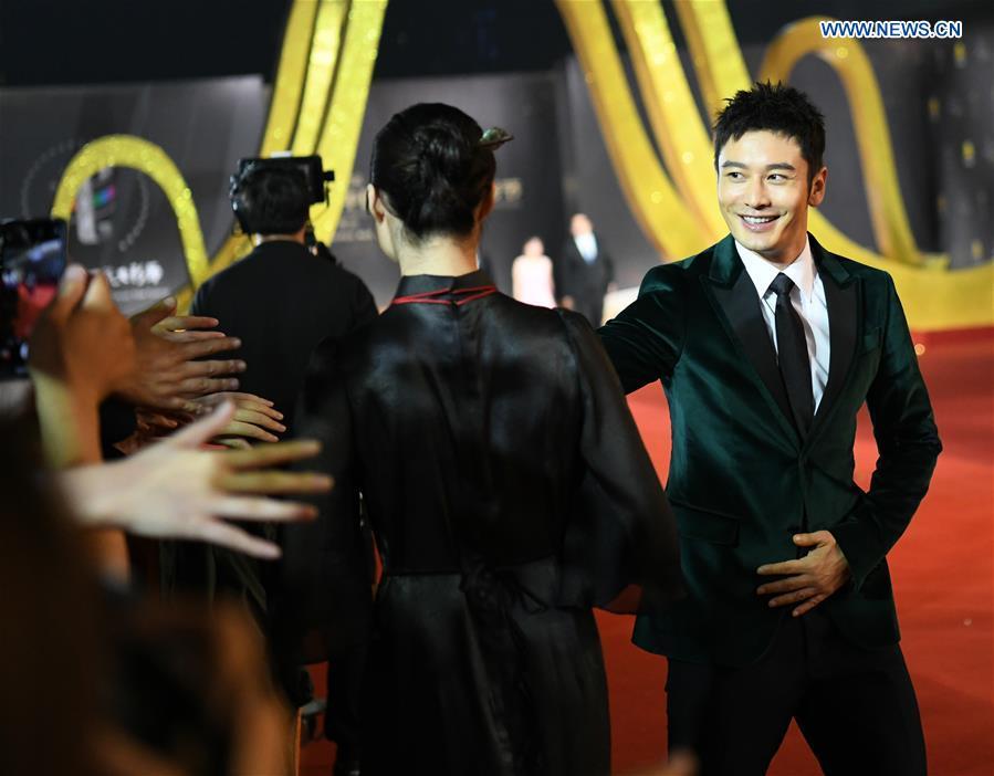 Actor Huang Xiaoming attends the red carpet ceremony of the 27th China Golden Rooster & Hundred Flowers Film Festival in Foshan, south China\'s Guangdong Province, Nov. 10, 2018. The red carpet ceremony of the 27th China Golden Rooster & Hundred Flowers Film Festival was held here on Saturday. (Xinhua/Deng Hua)