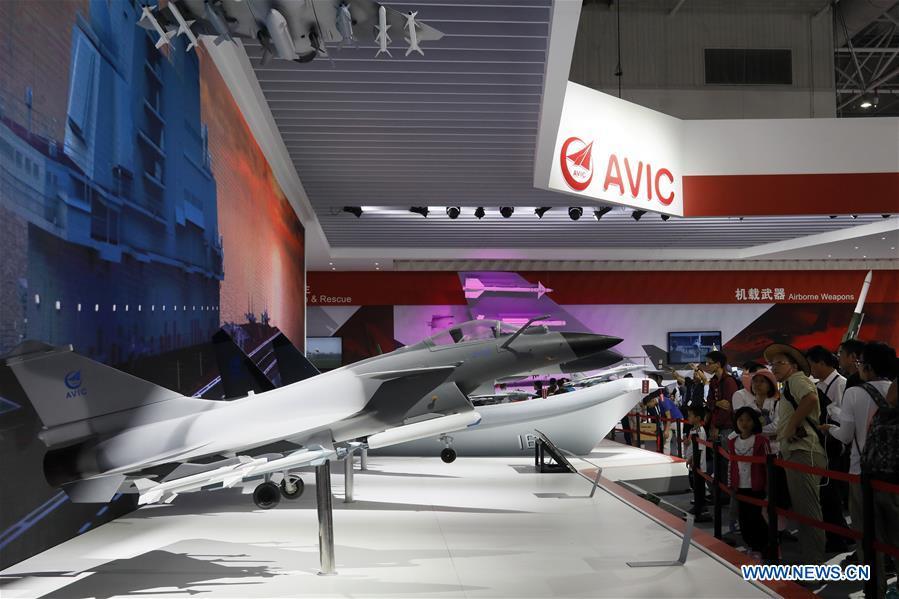 People visit the 12th China International Aviation and Aerospace Exhibition (Airshow China) in Zhuhai, south China\'s Guangdong Province, Nov. 10, 2018. Saturday marks the second of three public days of the Airshow China. (Xinhua/Liu Fang)