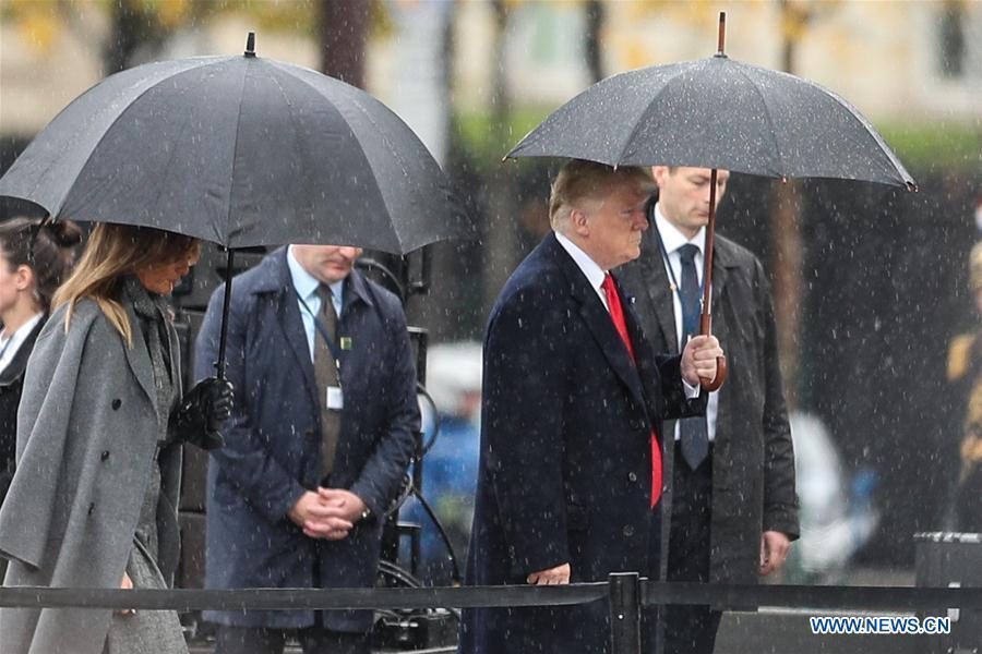 The U.S. President Donal Trump and his wife Melania Trump arrive for the ceremony to commemorate the 100th anniversary of the end of World War I in Paris, France, Nov. 11, 2018. (Xinhua/Zheng Huansong)