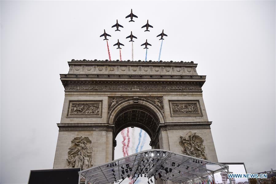 The Patrouille de France aerobatic team performs during a ceremony to mark the centenary of the Armistice of the First World War in Paris, France, Nov. 11, 2018. (Xinhua/Chen Yichen)
