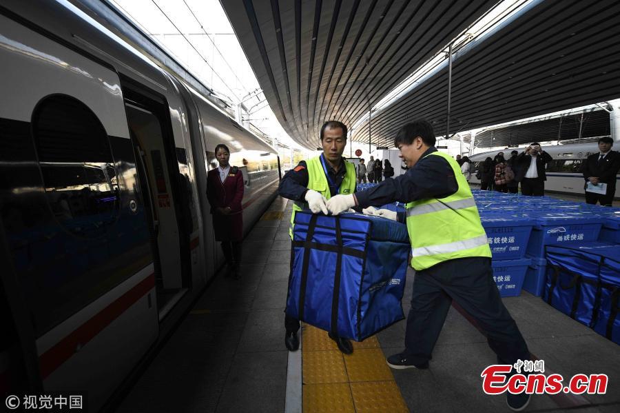 Fuxing bullet trains between Beijing and Changsha, the capital city of Central China\'s Hunan province, join the battle to deliver for Singles\' Day, an annual e-commerce shopping spree in China that falls on last Sunday. It is the first time that two Fuxing bullet trains between Beijing and Changsha deliver goods bought on Singles\' Day from Nov 11 to 20, each with a delivery capacity of about 50,000 tonnes. One carriage of each train will carry goods, mainly documents, garments, food, electronic devices, and others. Delivery time will be cut down to about five hours, faster than road transportation which usually takes 20 to 24 hours. (Photo/VCG)