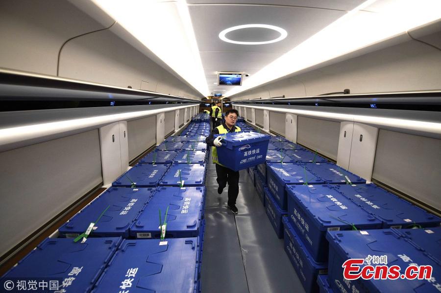 Fuxing bullet trains between Beijing and Changsha, the capital city of Central China\'s Hunan province, join the battle to deliver for Singles\' Day, an annual e-commerce shopping spree in China that falls on last Sunday. It is the first time that two Fuxing bullet trains between Beijing and Changsha deliver goods bought on Singles\' Day from Nov 11 to 20, each with a delivery capacity of about 50,000 tonnes. One carriage of each train will carry goods, mainly documents, garments, food, electronic devices, and others. Delivery time will be cut down to about five hours, faster than road transportation which usually takes 20 to 24 hours. (Photo/VCG)