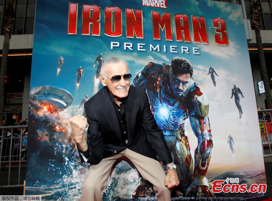 File photo: Stan Lee gestures as he poses at the premiere of \