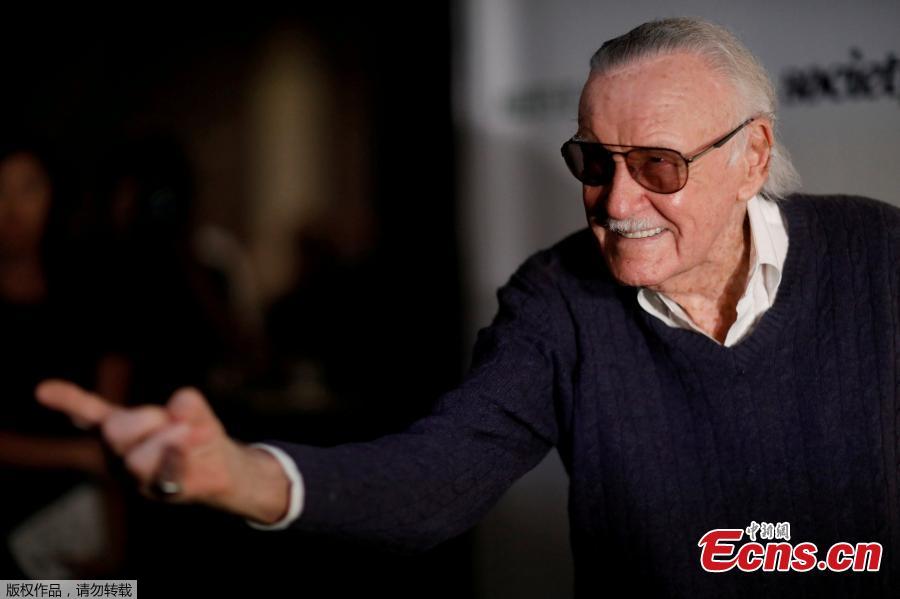 File photo: Marvel Comics co-creator Stan Lee poses at a tribute event \