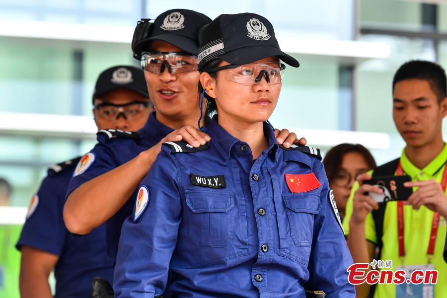 The second USIP World Police Service Pistol Shooting Championship takes place at the Guangdong provincial police training center in Foshan, Guangdong province on November 14, 2018. A total of 256 police from nearly 70 countries and regions across the world registered for the contest. (Photo: China News Service/ Chen Jimin)