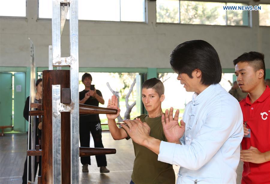 Wing Chun master Zheng Zujie (Front) teaches soldiers of Armed Forces of Malta (AFM) Wing Chun moves in Luca, Malta, on Nov. 13, 2018. In cooperation with the Malta Martial Arts Association and the local martial arts community, China Cultural Center in Malta invited Zheng Zujie, a martial arts instructor and Wing Chun master from China, to provide Wing Chun Military Fighting Training Course for the AFM on Tuesday. (Xinhua/Yuan Yun)