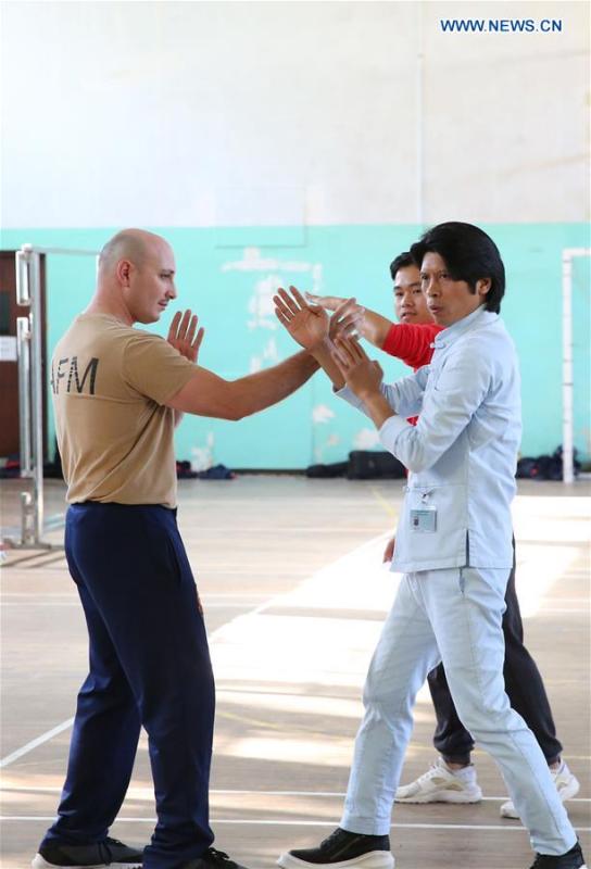 Wing Chun master Zheng Zujie (R) teaches soldiers of Armed Forces of Malta (AFM) Wing Chun moves in Luca, Malta, on Nov. 13, 2018. In cooperation with the Malta Martial Arts Association and the local martial arts community, China Cultural Center in Malta invited Zheng Zujie, a martial arts instructor and Wing Chun master from China, to provide Wing Chun Military Fighting Training Course for the AFM on Tuesday. (Xinhua/Yuan Yun)