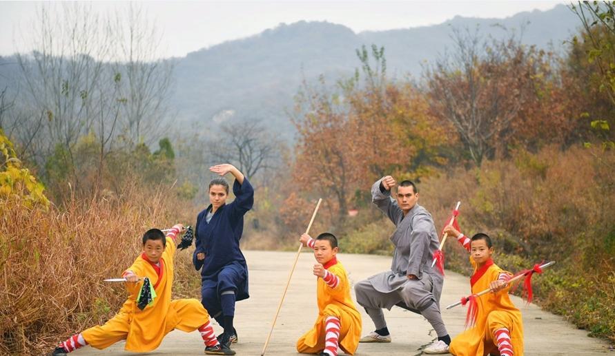 Monks at the famed Shaolin Temple exercise under the autumn leaves, November 11, 2018. The reputed birthplace of Kung Fu, the Shaolin Buddhist Temple lies at the foot of Songshan Mountain outside the city of Dengfeng, Henan Province. (Photo/Xinhua)