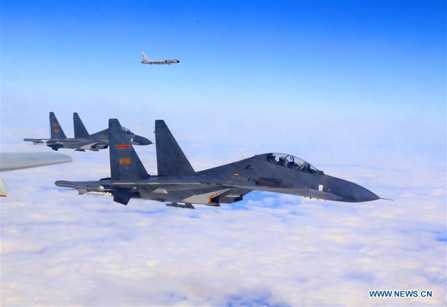 The People\'s Liberation Army (PLA) air force planes are seen conducting training exercises, Nov. 19, 2017. The Chinese Air Force announced a roadmap for building a stronger modern air force in three steps. The building of a stronger modern air force is in line with the overall goal of building national defense and the armed forces, Lieutenant General Xu Anxiang, deputy commander of Chinese Air Force, said at a press conference on celebrating the 69th anniversary of the establishment of Chinese Air Force held in Zhuhai, south China\'s Guangdong Province, Nov. 11, 2018. (Xinhua/Chen Liang)