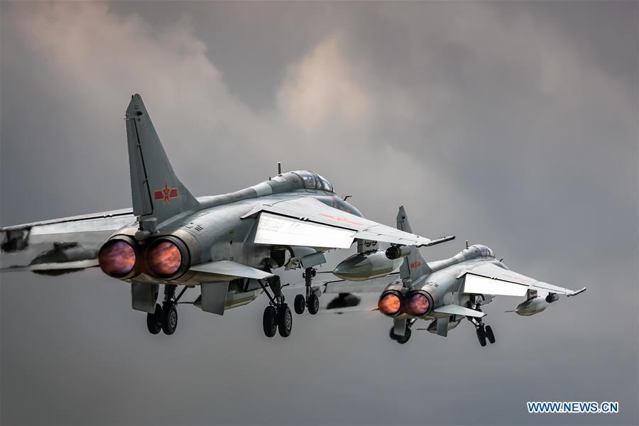 Two People\'s Liberation Army (PLA) airforce JH-7A fighter-bombers are seen during a training module in preparation for the International Army Games on July 12, 2018. The Chinese Air Force announced a roadmap for building a stronger modern air force in three steps. The building of a stronger modern air force is in line with the overall goal of building national defense and the armed forces, Lieutenant General Xu Anxiang, deputy commander of Chinese Air Force, said at a press conference on celebrating the 69th anniversary of the establishment of Chinese Air Force held in Zhuhai, south China\'s Guangdong Province, Nov. 11, 2018. (Xinhua/Yang Pan)