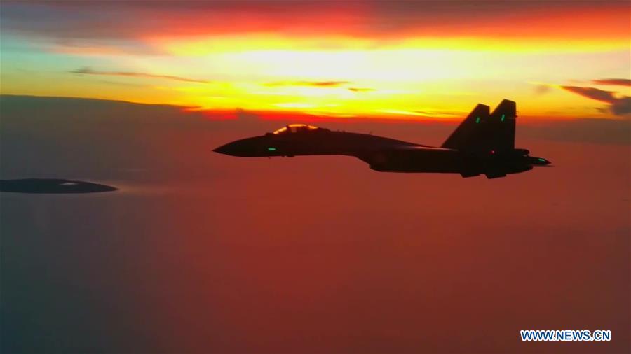 Photo of a video capture shows Su-35 fighter jets are on patrol Feb. 7, 2018. The Chinese Air Force announced a roadmap for building a stronger modern air force in three steps. The building of a stronger modern air force is in line with the overall goal of building national defense and the armed forces, Lieutenant General Xu Anxiang, deputy commander of Chinese Air Force, said at a press conference on celebrating the 69th anniversary of the establishment of Chinese Air Force held in Zhuhai, south China\'s Guangdong Province, Nov. 11, 2018. (Xinhua)