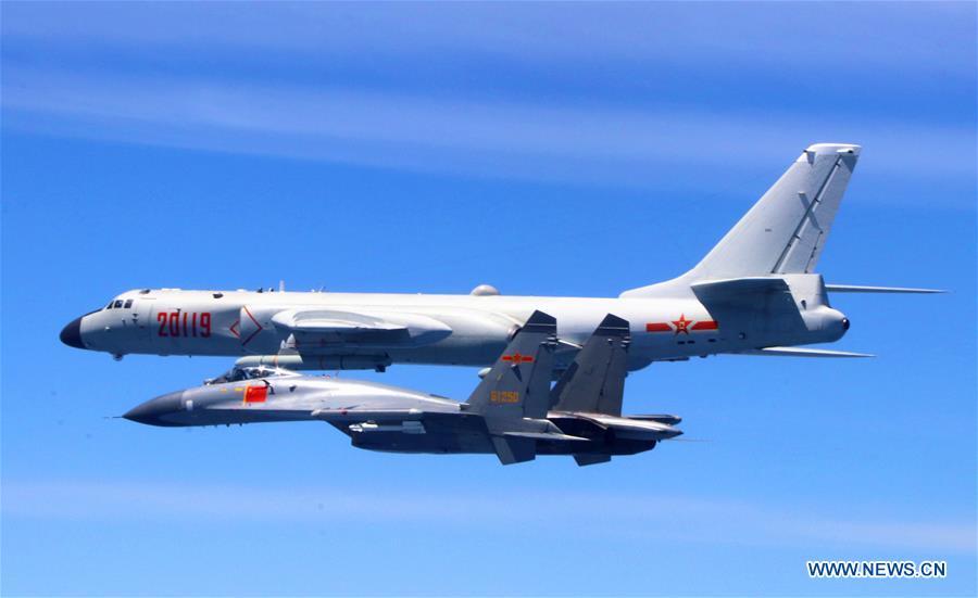 A Chinese People\'s Liberation Army (PLA) air force formation conducts island patrols during training on April 26, 2018. The Chinese Air Force announced a roadmap for building a stronger modern air force in three steps. The building of a stronger modern air force is in line with the overall goal of building national defense and the armed forces, Lieutenant General Xu Anxiang, deputy commander of Chinese Air Force, said at a press conference on celebrating the 69th anniversary of the establishment of Chinese Air Force held in Zhuhai, south China\'s Guangdong Province, Nov. 11, 2018. (Xinhua/Wu Yuepeng)