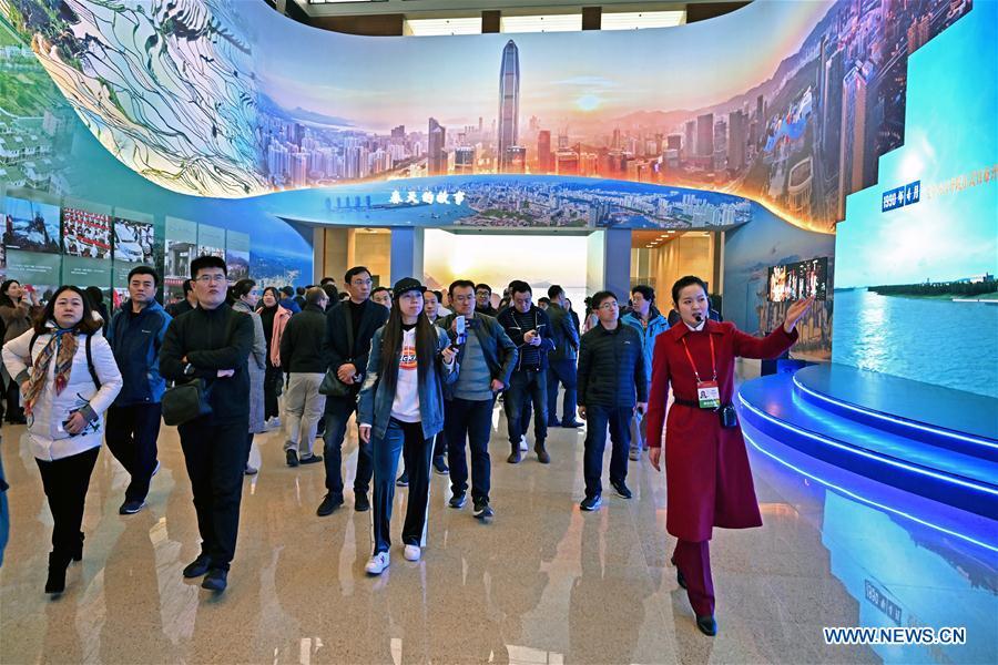 Visitors view exhibits at a major exhibition to commemorate the 40th anniversary of China\'s reform and opening-up held at the National Museum of China in Beijing, capital of China, Nov. 14, 2018. The exhibition opened here on Tuesday. (Xinhua/Li Xin)