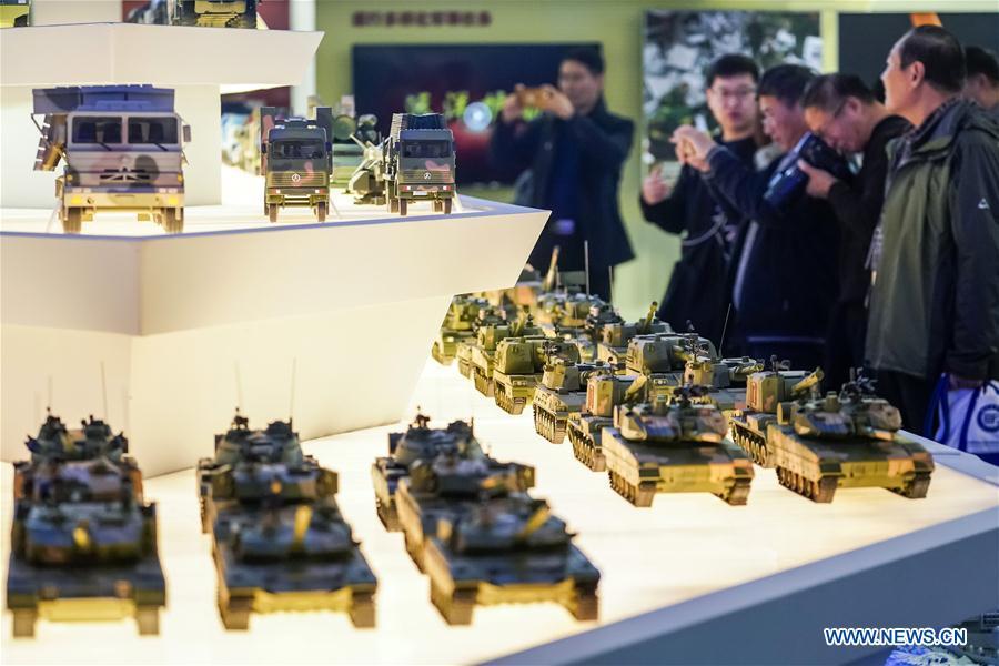 Visitors view exhibits at a major exhibition to commemorate the 40th anniversary of China\'s reform and opening-up held at the National Museum of China in Beijing, capital of China, Nov. 14, 2018. The exhibition opened here on Tuesday. (Xinhua/Shen Bohan)