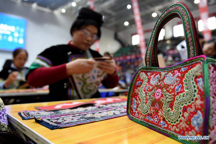 Photo taken on Nov. 15, 2018 shows embroidery works at a manual skills competition held in Rongjiang County of Qiandongnan Miao and Dong Autonomous Prefecture, southwest China\'s Guizhou Province. A number of artisans from the county participated in the competition in aspects of spinning, weaving, wax printing, embroidery and so on. (Xinhua/Liu Jinyin)
