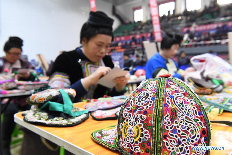 Photo taken on Nov. 15, 2018 shows an embroidery work at a manual skills competition held in Rongjiang County of Qiandongnan Miao and Dong Autonomous Prefecture, southwest China\'s Guizhou Province. A number of artisans from the county participated in the competition in aspects of spinning, weaving, wax printing, embroidery and so on. (Xinhua/Wang Bingzhen)