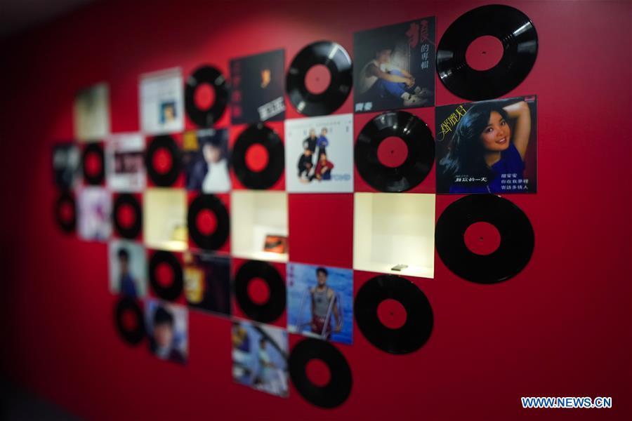 A wall of vintage vinyl records is displayed at a major exhibition to commemorate the 40th anniversary of China\'s reform and opening-up at the National Museum of China in Beijing, capital of China, Nov. 15, 2018. Vintage objects are displayed at the exhibition which opened here on Tuesday to show visitors the history, accomplishments, and experience of China\'s reform and opening-up.(Xinhua/Shen Bohan)