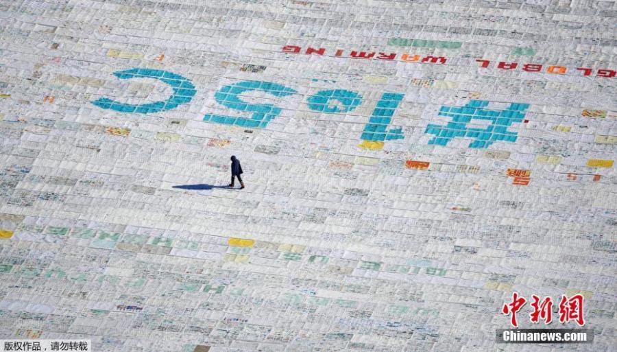 At the center of the postcard was a huge slogan that read \