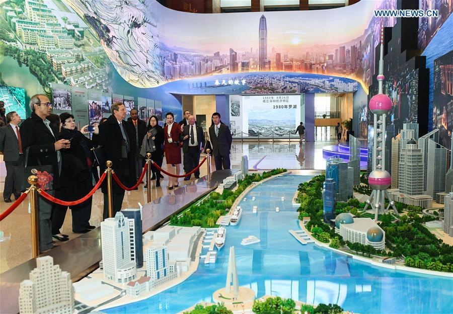 Foreign visitors view Shanghai\'s architectural models during a major exhibition to commemorate the 40th anniversary of China\'s reform and opening-up at the National Museum of China in Beijing, capital of China, Nov. 19, 2018. (Xinhua/Li He)