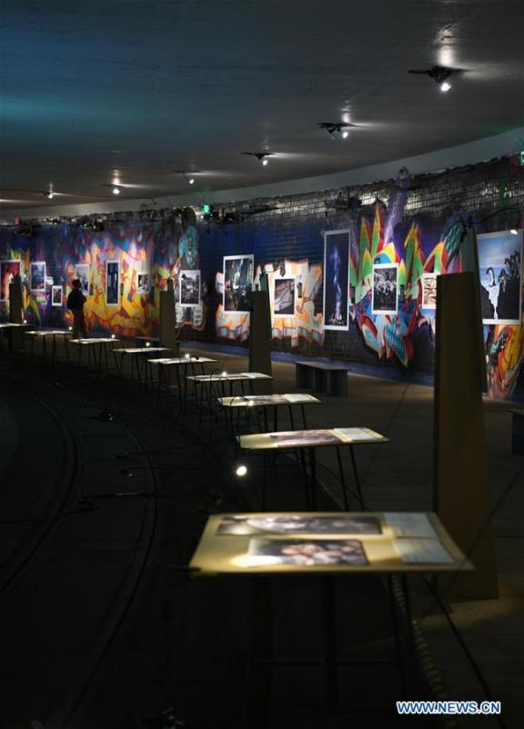 Photo taken on Nov. 19, 2018 shows photographs exhibited at the World Press Photo Exhibition 2018 at Dupont Underground in Washington D.C., the United States. The exhibition, which is held from Oct. 27 to Nov. 25, showcases the winning photographs from the 61st annual World Press Photo contest, which received over 70,000 photographs taken by 4,548 photographers. (Xinhua/Liu Jie)