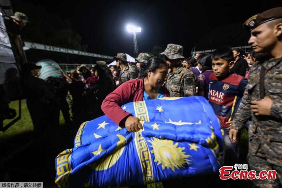 Residents of several communities nearby the erupting Fuego volcano, arrive at a temporary shelter in Escuintla department, 35 km south of Guatemala City on Nov. 19, 2018. Guatemalan authorities on Monday declared a red alert after the Fuego volcano erupted again, forcing almost 3,000 residents to flee. (Photo/Agencies)