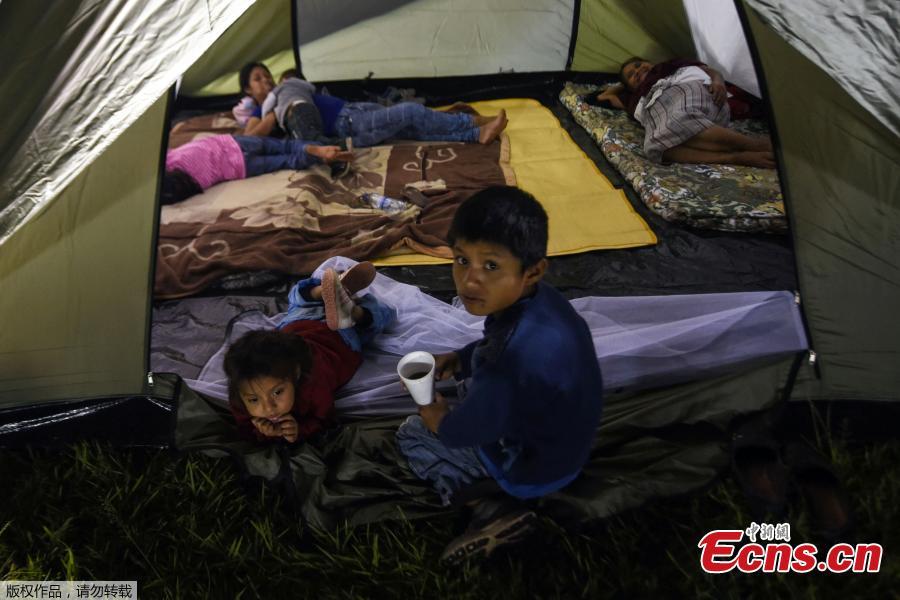 Residents of several communities nearby the erupting Fuego volcano, stay at a temporary shelter in Escuintla department, 35 km south of Guatemala City on Nov. 19, 2018. - Guatemalan authorities on Monday declared a red alert after the Fuego volcano erupted again, forcing almost 3,000 residents to flee. (Photo/Agencies)