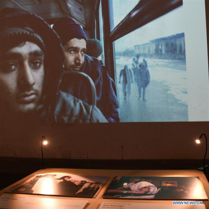 Photo taken on Nov. 19, 2018 shows photographs exhibited at the World Press Photo Exhibition 2018 at Dupont Underground in Washington D.C., the United States. The exhibition, which is held from Oct. 27 to Nov. 25, showcases the winning photographs from the 61st annual World Press Photo contest, which received over 70,000 photographs taken by 4,548 photographers. (Xinhua/Liu Jie)