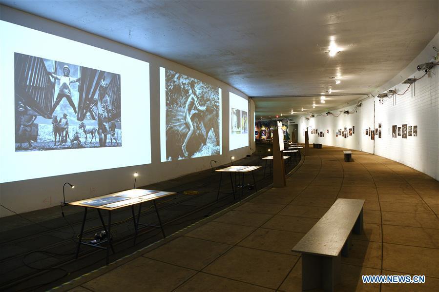 Photo taken on Nov. 19, 2018 shows photographs exhibited at the World Press Photo Exhibition 2018 at Dupont Underground in Washington D.C., the United States. The exhibition, which is held from Oct. 27 to Nov. 25, showcases the winning photographs from the 61st annual World Press Photo contest, which received over 70,000 photographs taken by 4,548 photographers. (Xinhua/Liu Jie)